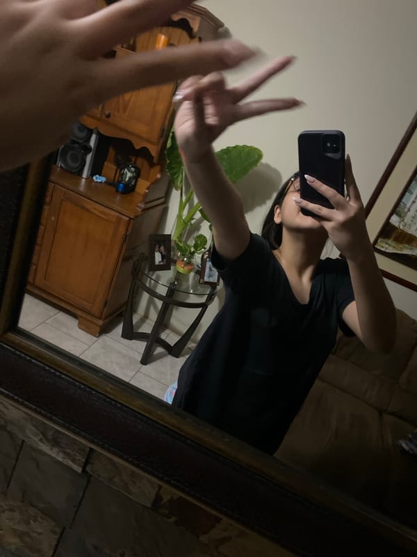 Late-night casual photography session documented in Venezuelan home