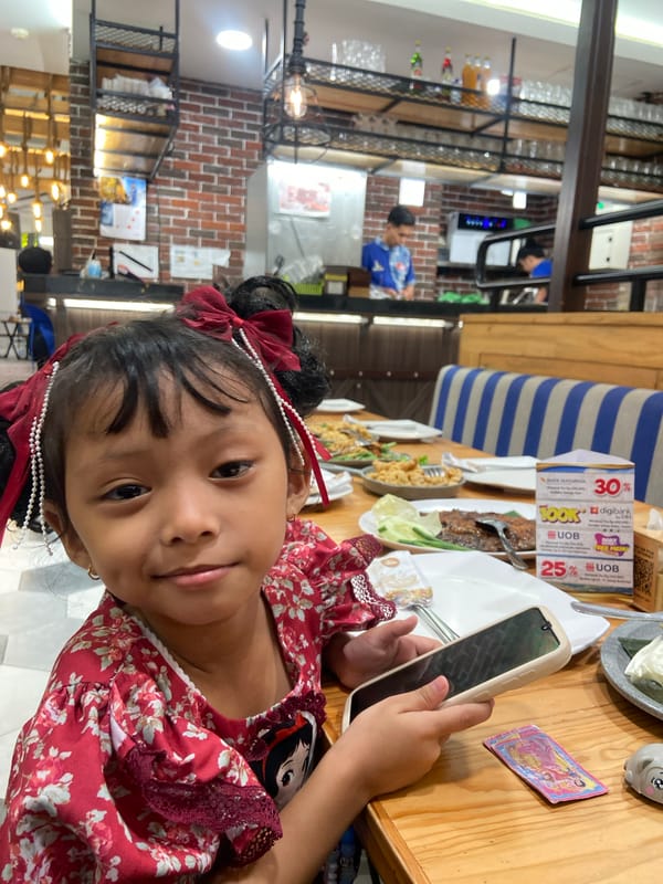 Family enjoys Indonesian meal at Surabaya restaurant