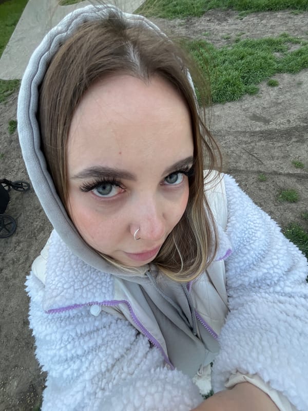 Friends photograph each other during riverside outing in Krasnodar
