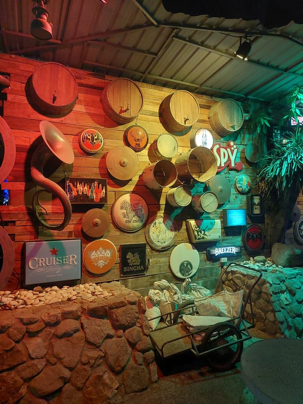 Cluttered bar wall decor at a Ko Samui venue