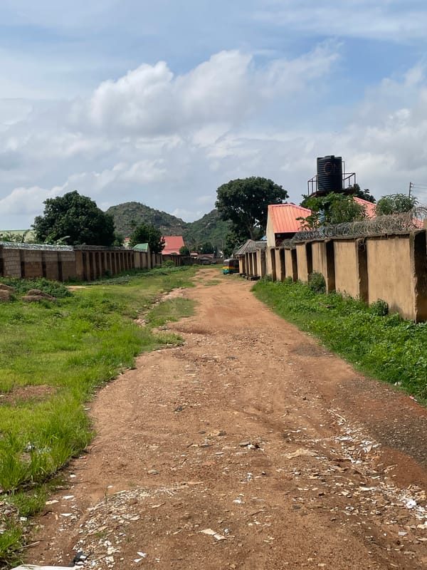 Street life and cash exchange in a Jos residential neighborhood