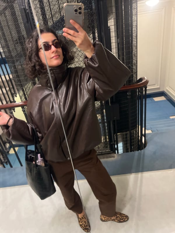 Person Takes Mirror Selfie on Parisian Stairway