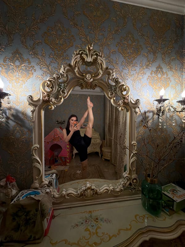 Mirror selfies and split poses in an ornate indoor space
