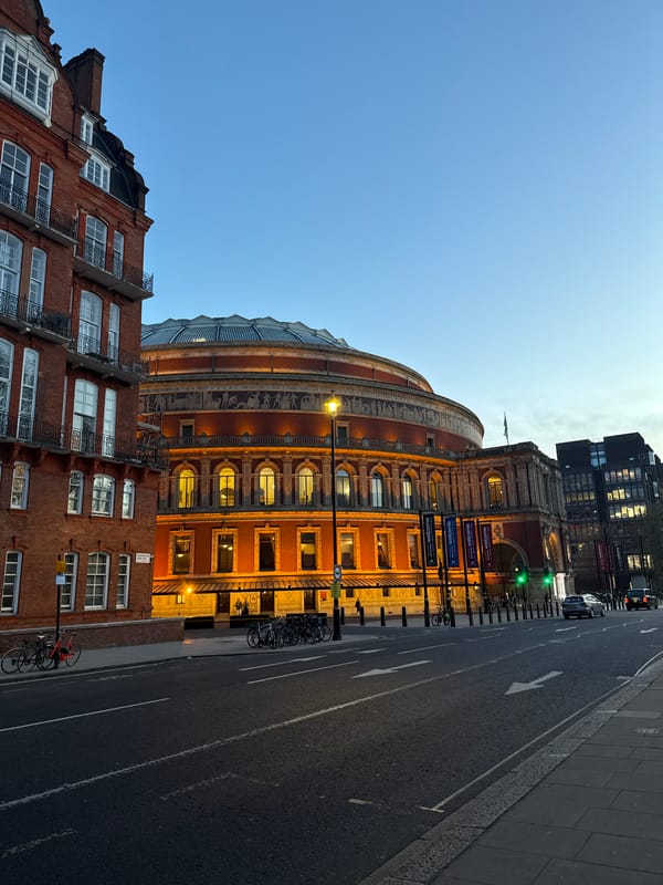 Evening street life documented near Royal Albert Hall