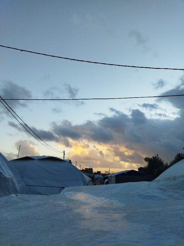 Twilight scenes documented at temporary encampment in Khan Yunis