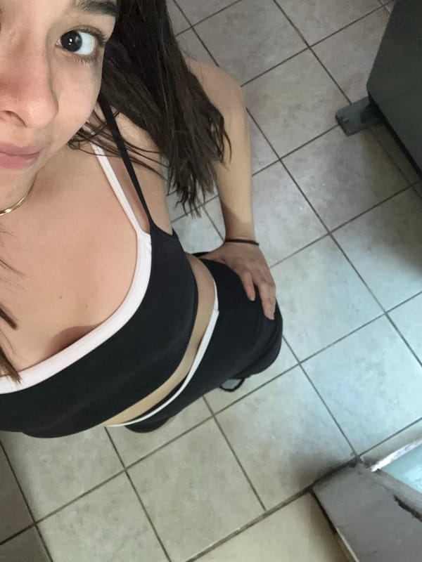 Woman photographed in casual poses in Puebla kitchen