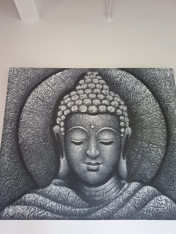 Visitor documents art and culture at Ubud gallery space