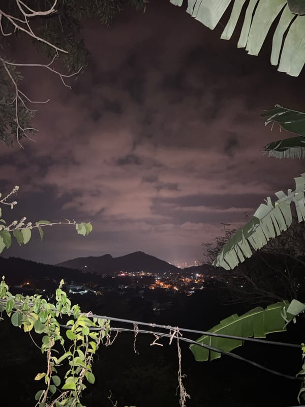 Nighttime cityscape observed in Tây Nha Trang under cloudy skies