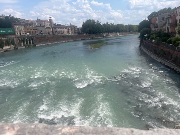 Multiple angles on the Adige River cutting through Verona
