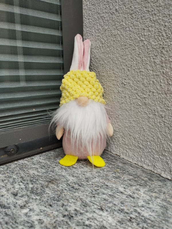 Casual street photography captures decorative items and parked car in Biasca
