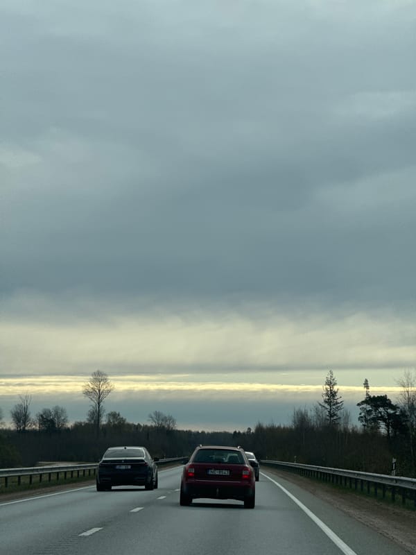 Two cars spotted on Latvian highway, license UP-66 noted