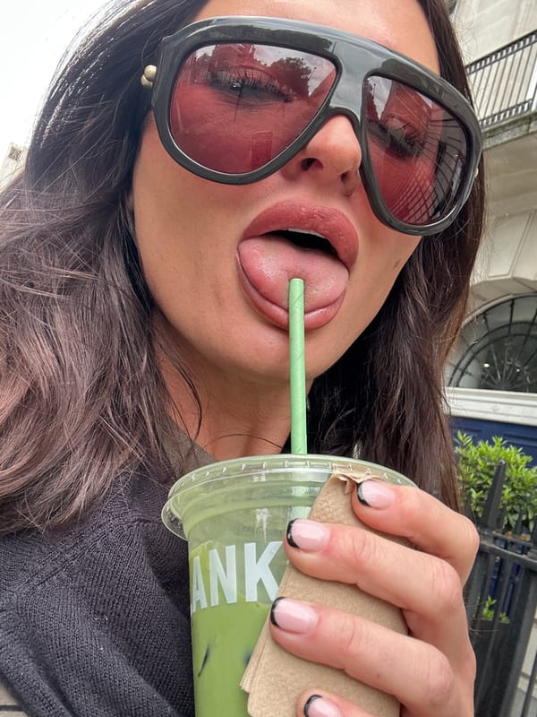 Woman enjoys casual lunch at London café