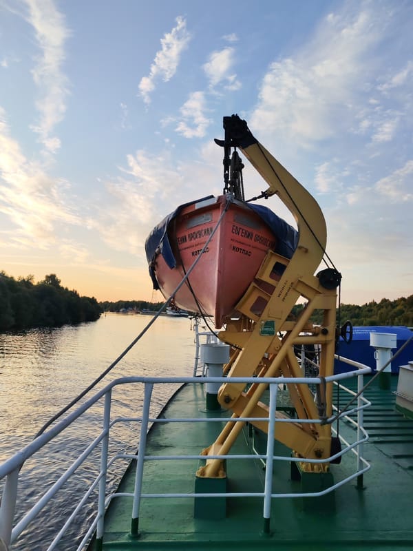 On a river vessel near Annensky Most at dusk
