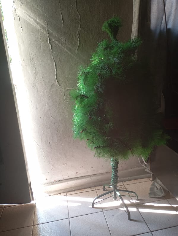 Artificial Christmas tree partially assembled indoors in Johannesburg