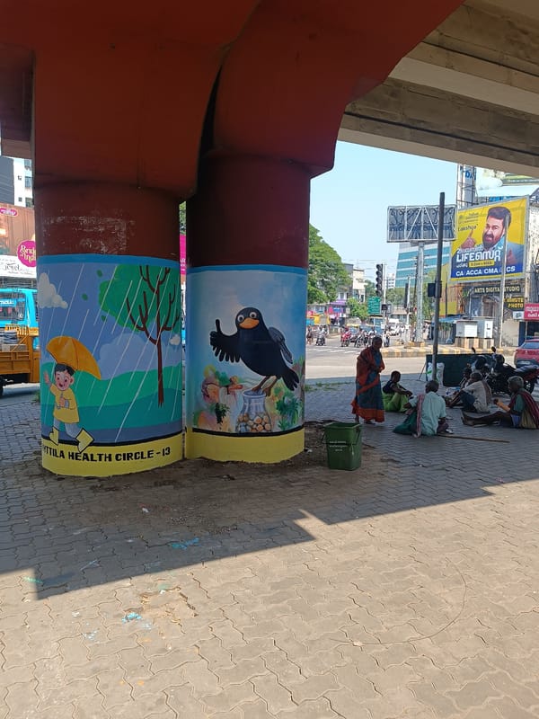 Tea vendor serves customers at outdoor stall in Ernakulam