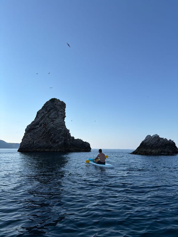 Paddleboarding the quiet Adriatic off Kaluđerac's coastline