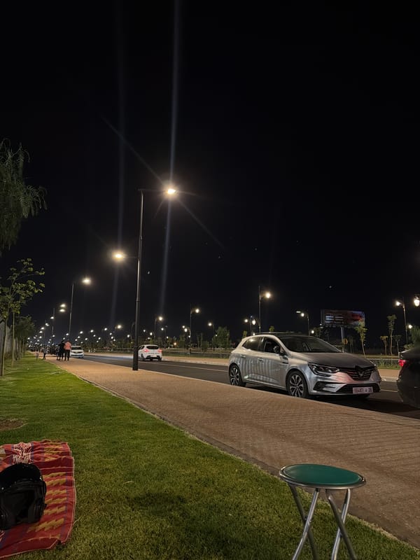 Nighttime street scene captured in Ouahat Sidi Brahim, Morocco