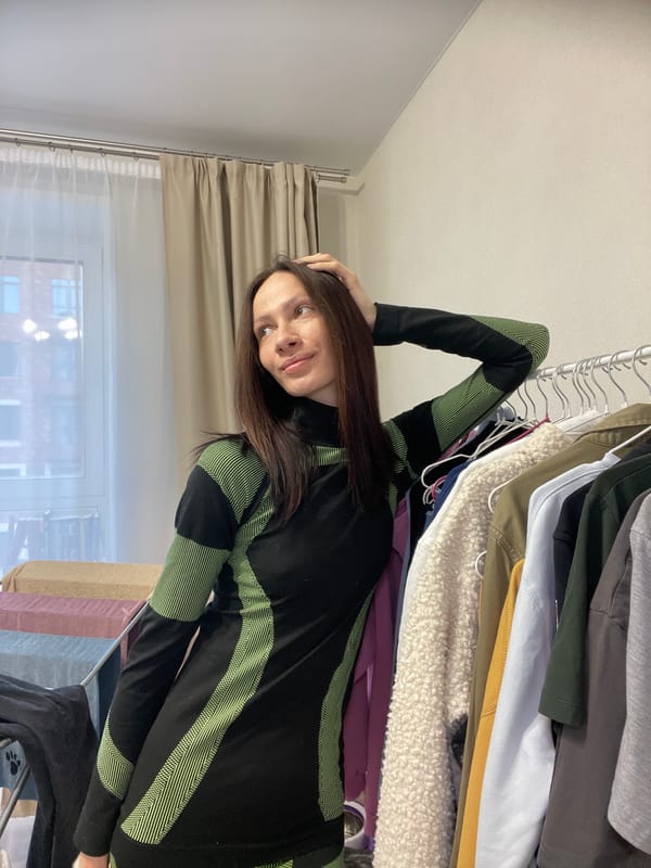 Morning portraits captured in Pervomaysky feature woman and cat