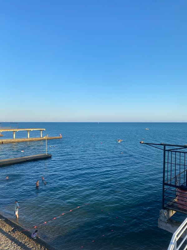 Sochi's Black Sea beach packed on a summer afternoon