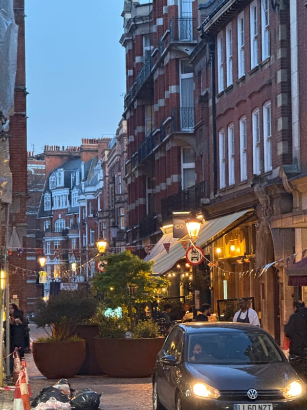 Pedestrians and cyclists share London street crossing