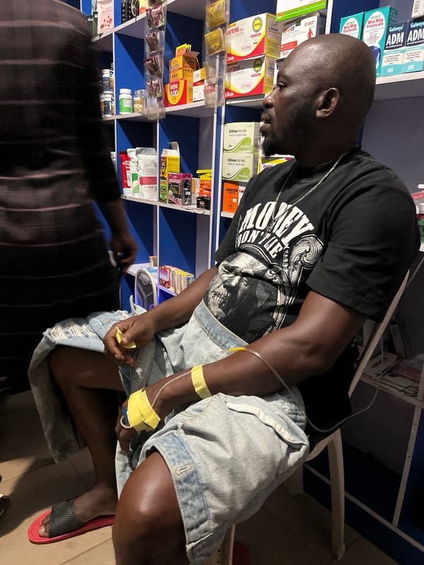Person observed at pharmacy/clinic in Obosi, Nigeria