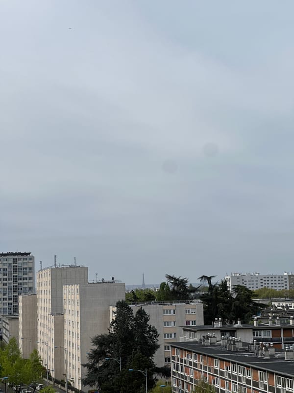 Morning documentation of household items and Paris skyline views
