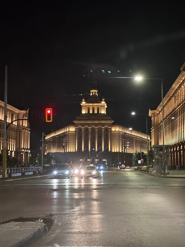 Sofia landmarks illuminated during wet evening hours