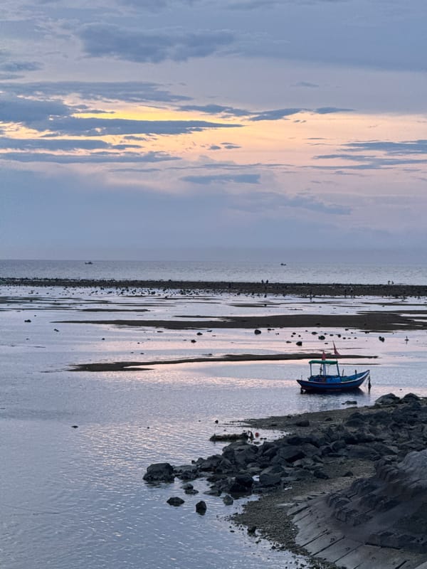 Fishing boats at dusk in Lý Sơn Island harbor