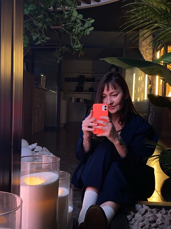 Woman takes selfies at Votkinsk restaurant during afternoon visit