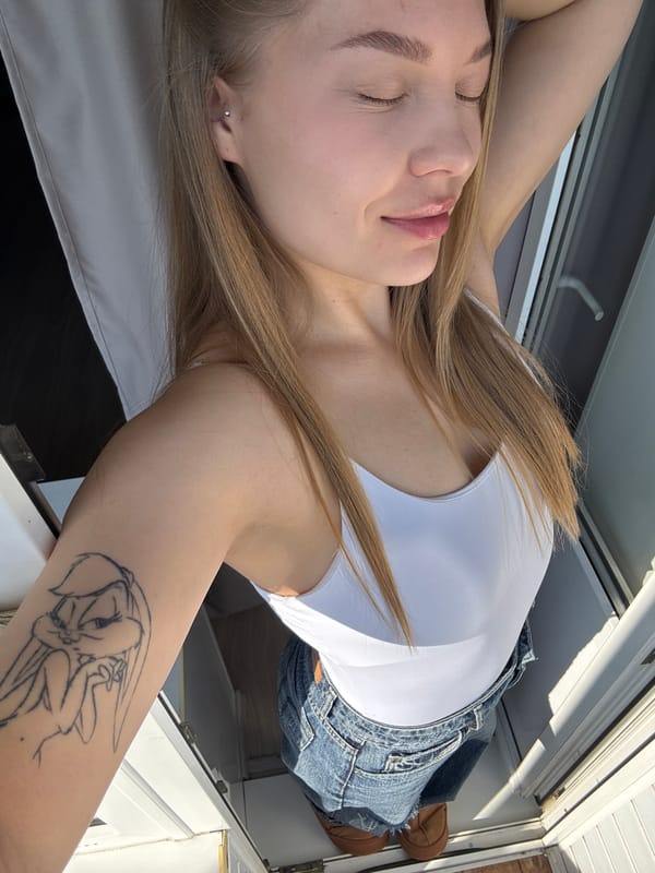 Woman with Bugs Bunny tattoo photographed in Chaikovsky, Russia