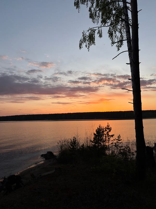 Sunset observed over lake near Zabegaevo, Russia