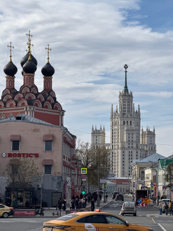 Moscow street scene with Stalinist skyscraper captured by witness