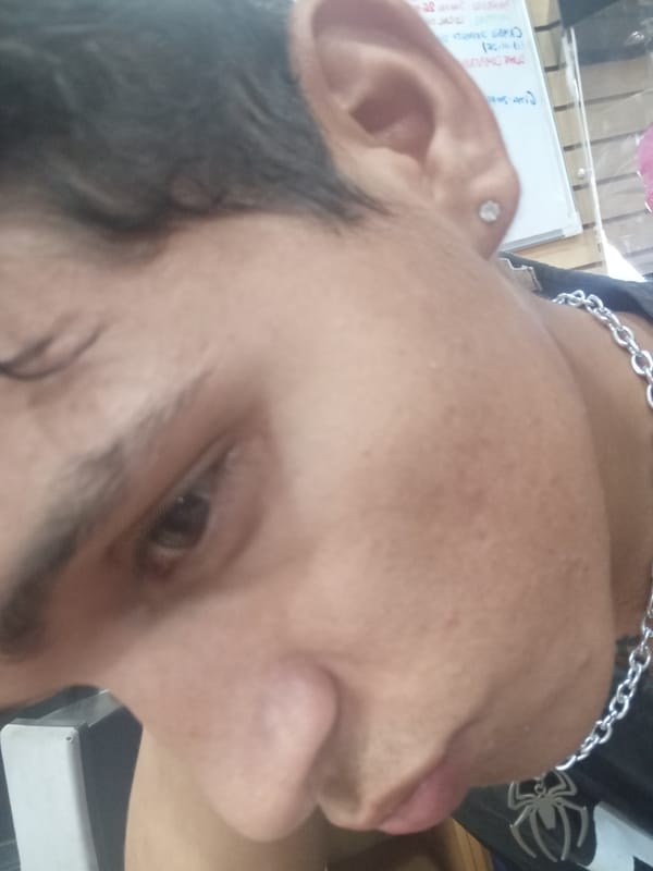 Person takes multiple selfies in Juan Griego, Venezuela