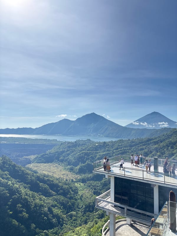 Tourists gather at Kintamani scenic overlook for volcanic views