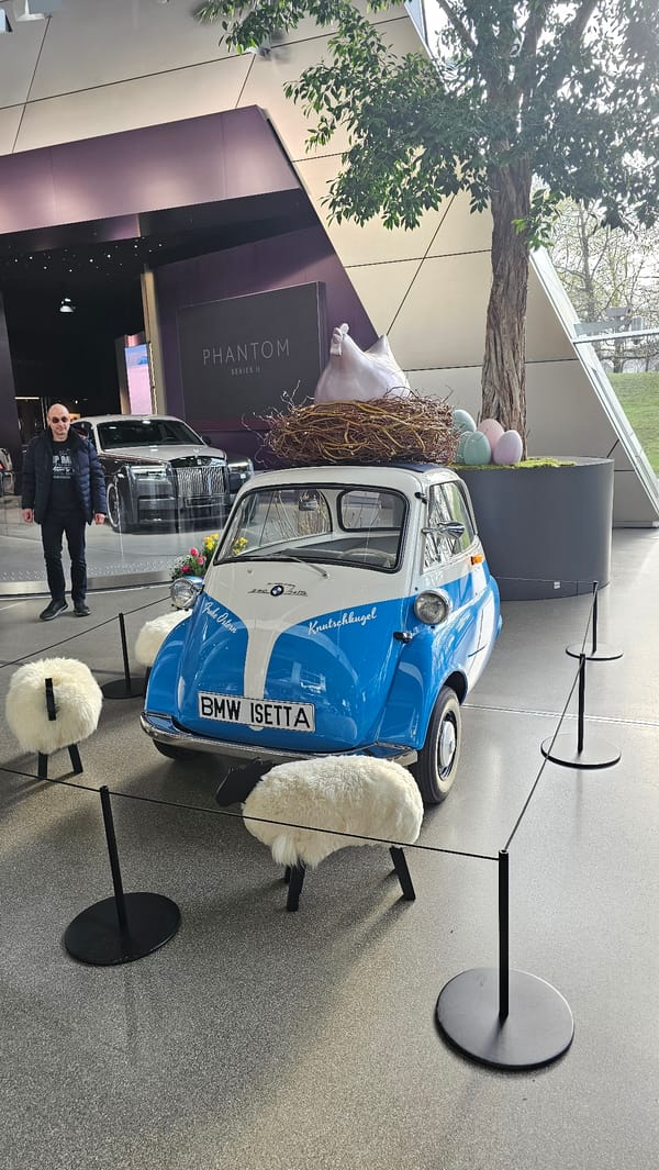 Tourist documents BMW Welt and Olympic Park tour in Munich