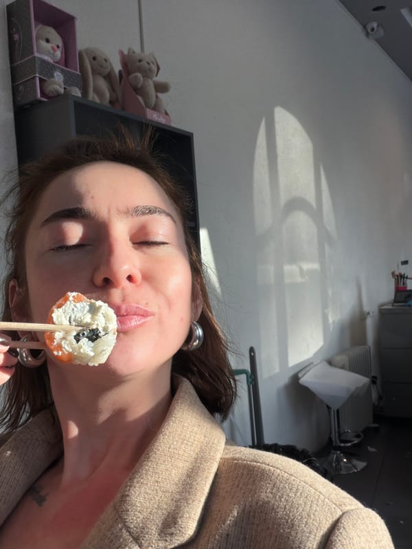 Woman enjoys sushi lunch in Ust-Ilimsk, Russia