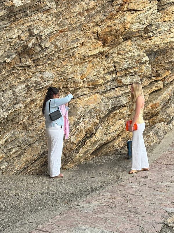 Tourists photograph scenic moments across Budva, Montenegro waterfront