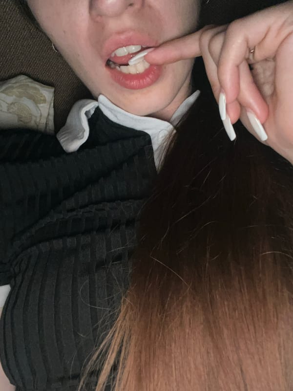 Playful close-up poses featuring a pink bear fan and acrylic nails