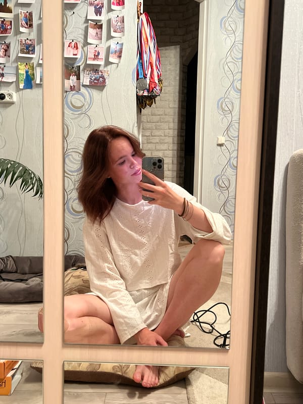 Woman documents daily life through mirror selfies in Chaikovsky