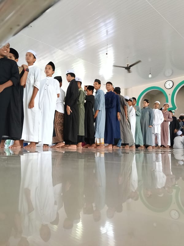 Young Muslims gather at religious building in Lhokseumawe