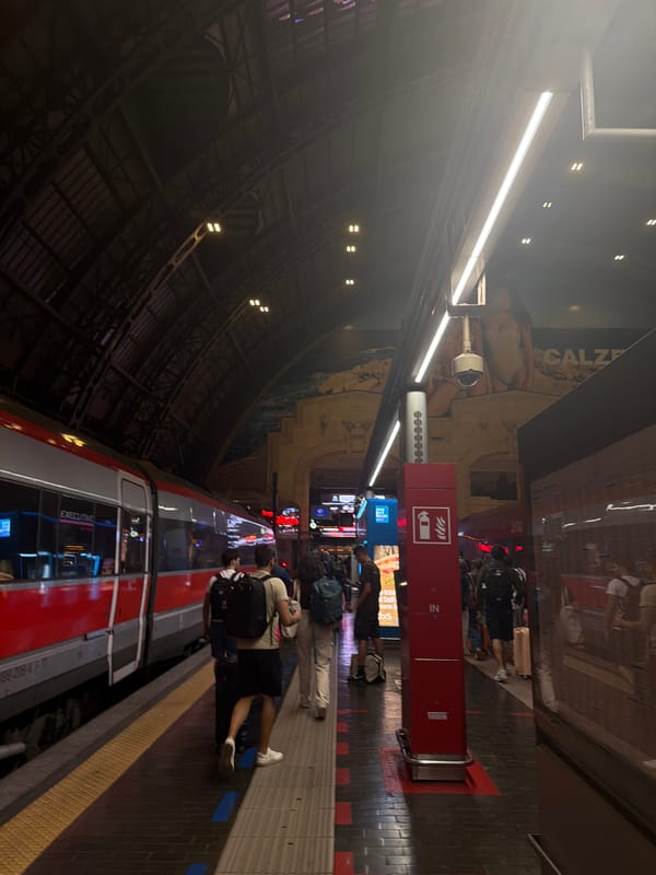 Evening scenes captured at Milan Centrale station, June 2026