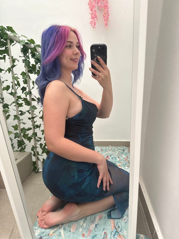 Woman takes colorful hair selfies in Zagreb apartment