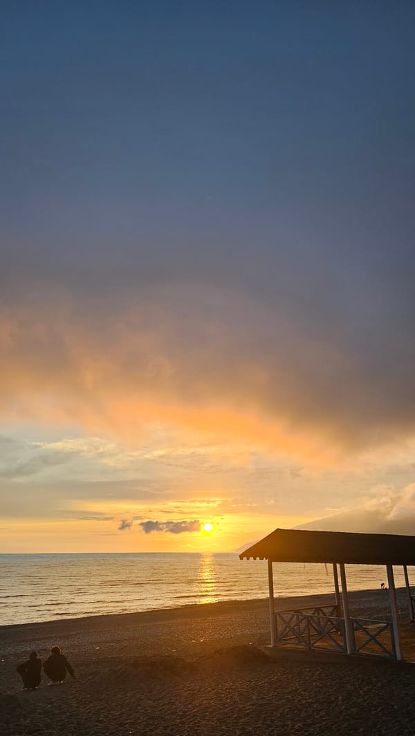 Evening life captured across Gagra's beaches and cafes