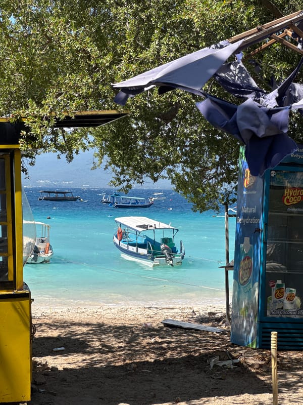 Lazy morning on an Indonesian beach, boats and all