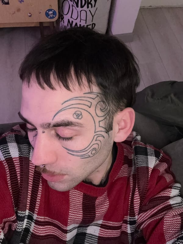 Tattooed face in close-up, Buenos Aires
