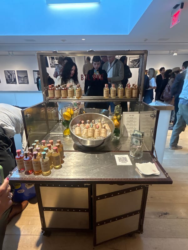 Early morning indoor event in West Hollywood features bar, artwork