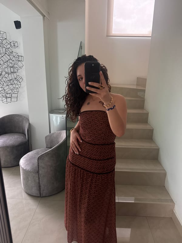Mirror selfies in a modern Mexican interior, dressed up for the night