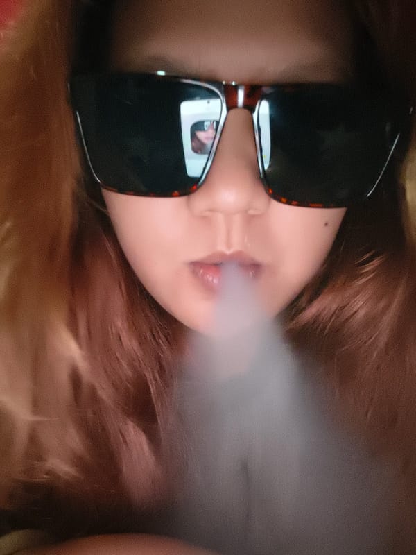 Person vaping captured in multiple photos in Depok