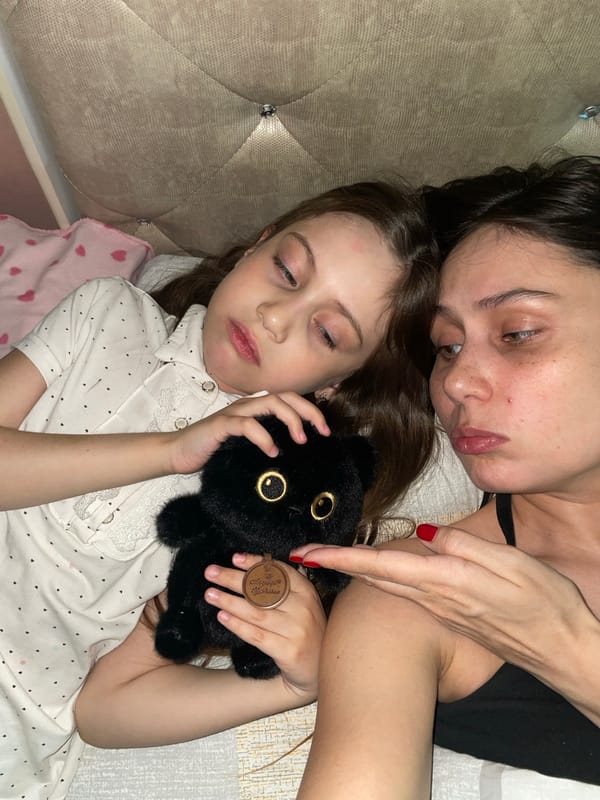 Mother and child share quiet bedtime moments in Izhevsk