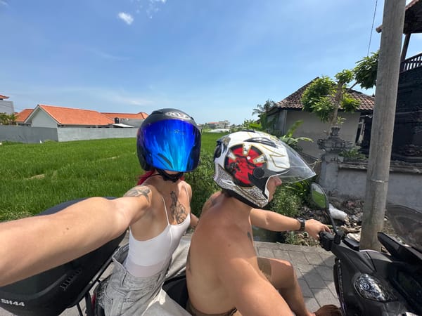 Two motorcyclists observed on parked bike in North Kuta